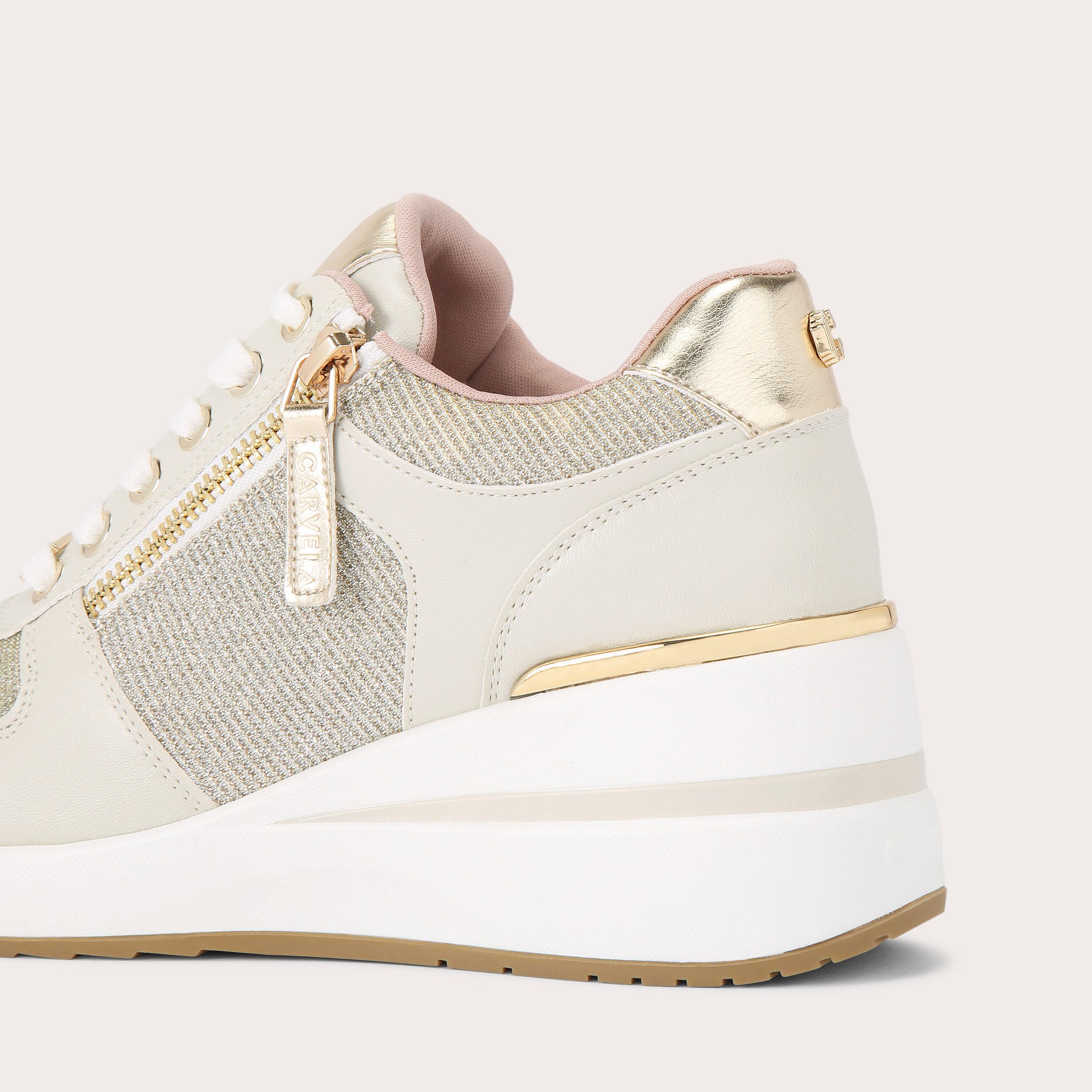 HIGH RISE Gold Fabric Trainer by CARVELA