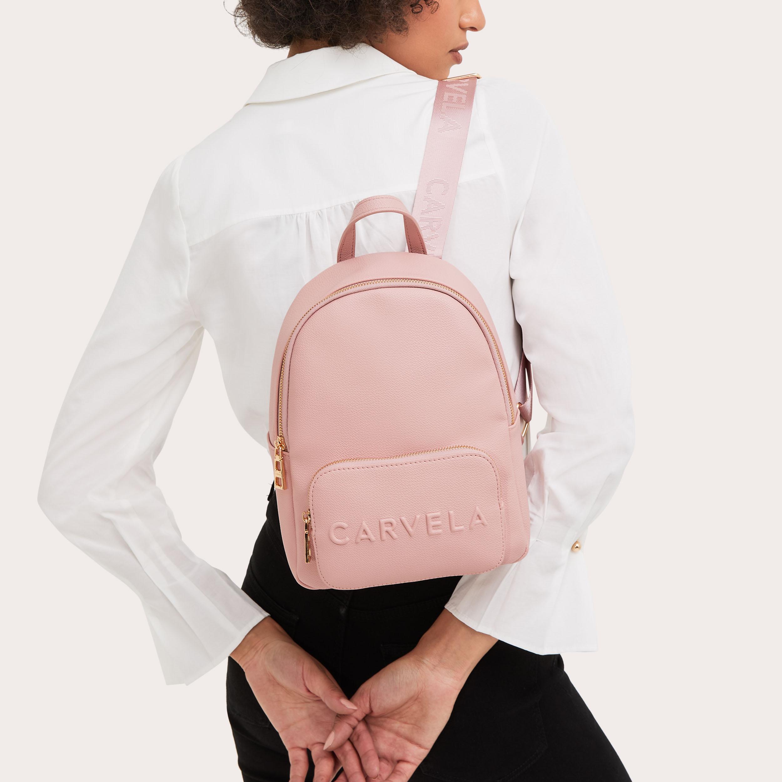 Pale pink backpack on sale