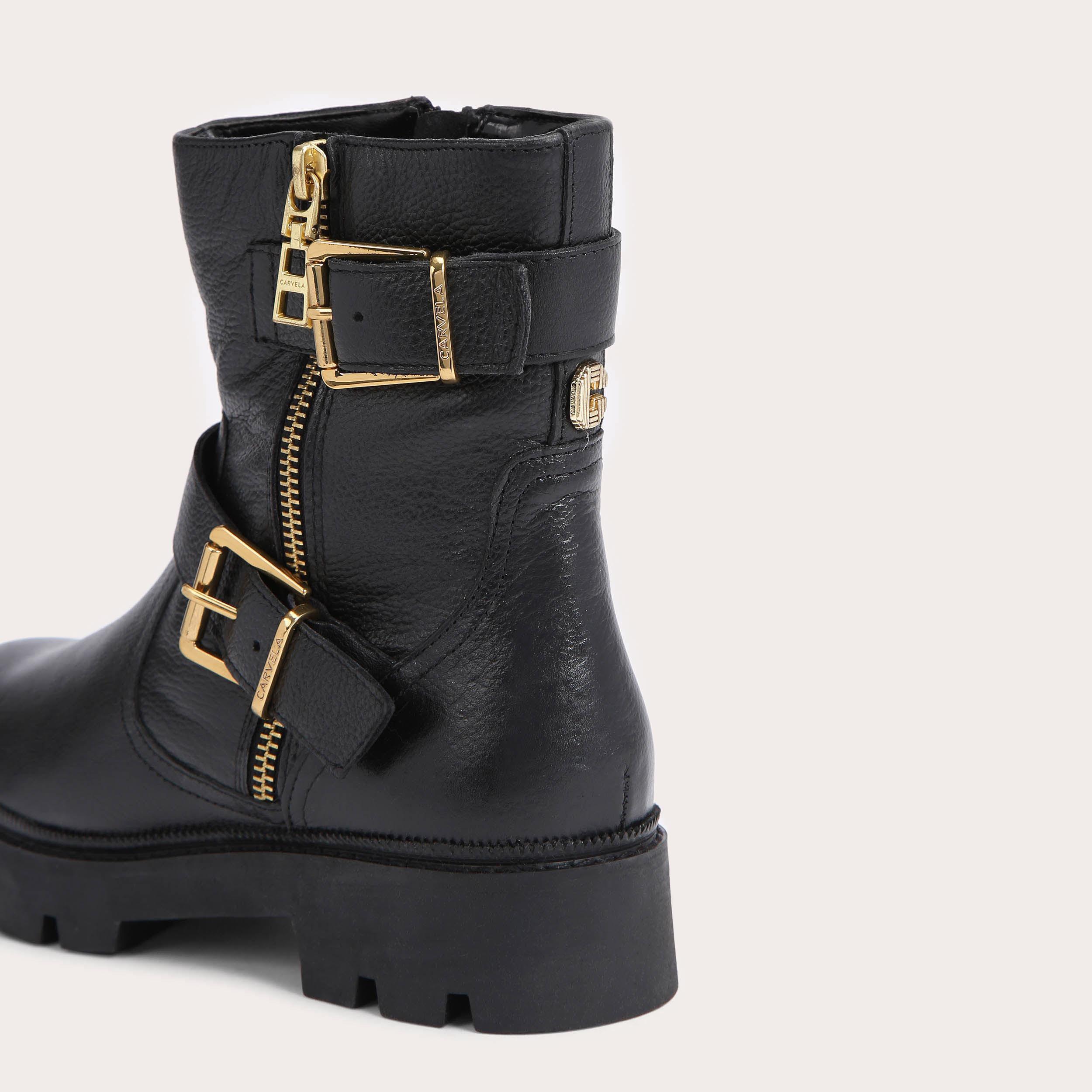 Black boots with gold buckles hotsell