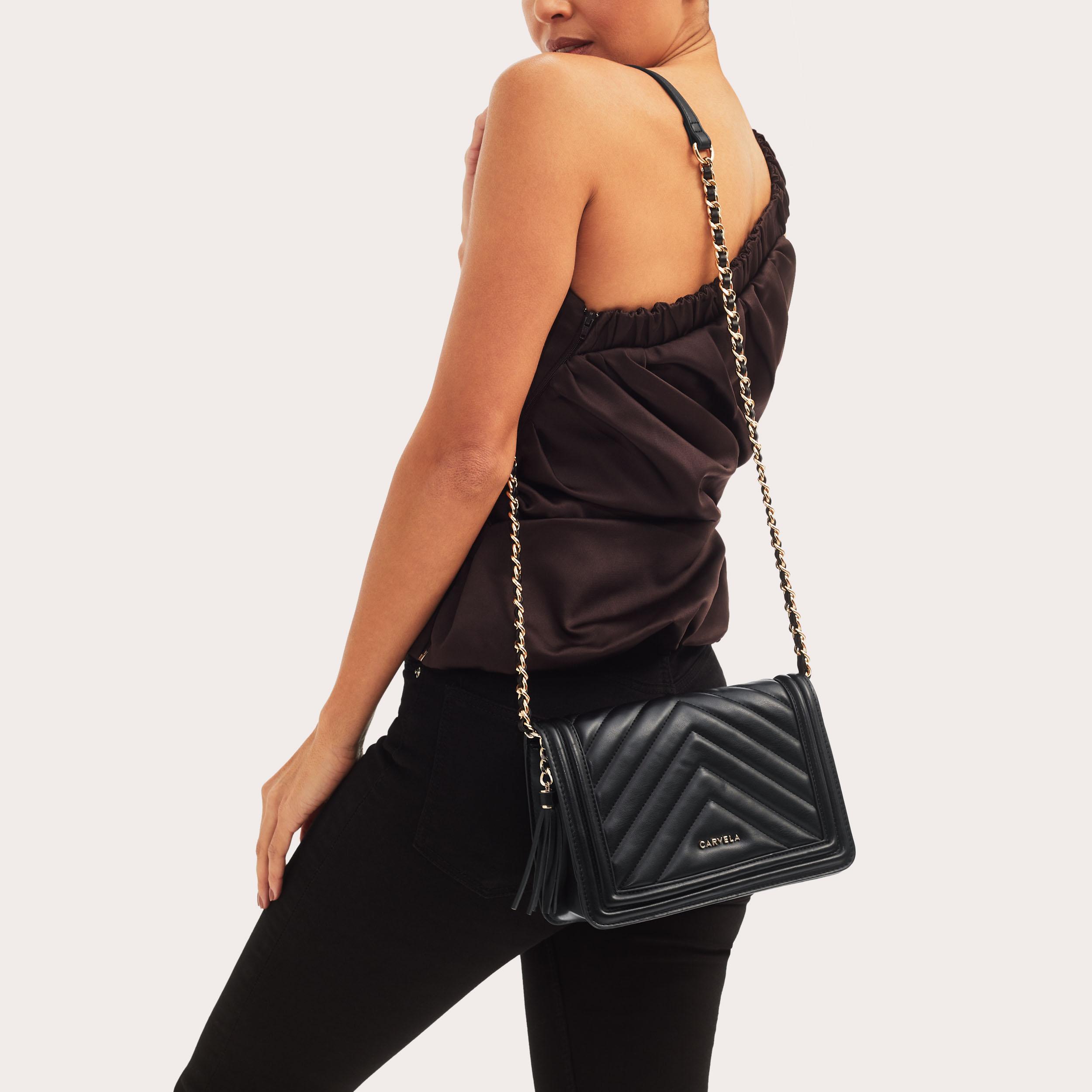LARA TASSEL FLAPOVER Black Quilted Cross Body Bag by CARVELA