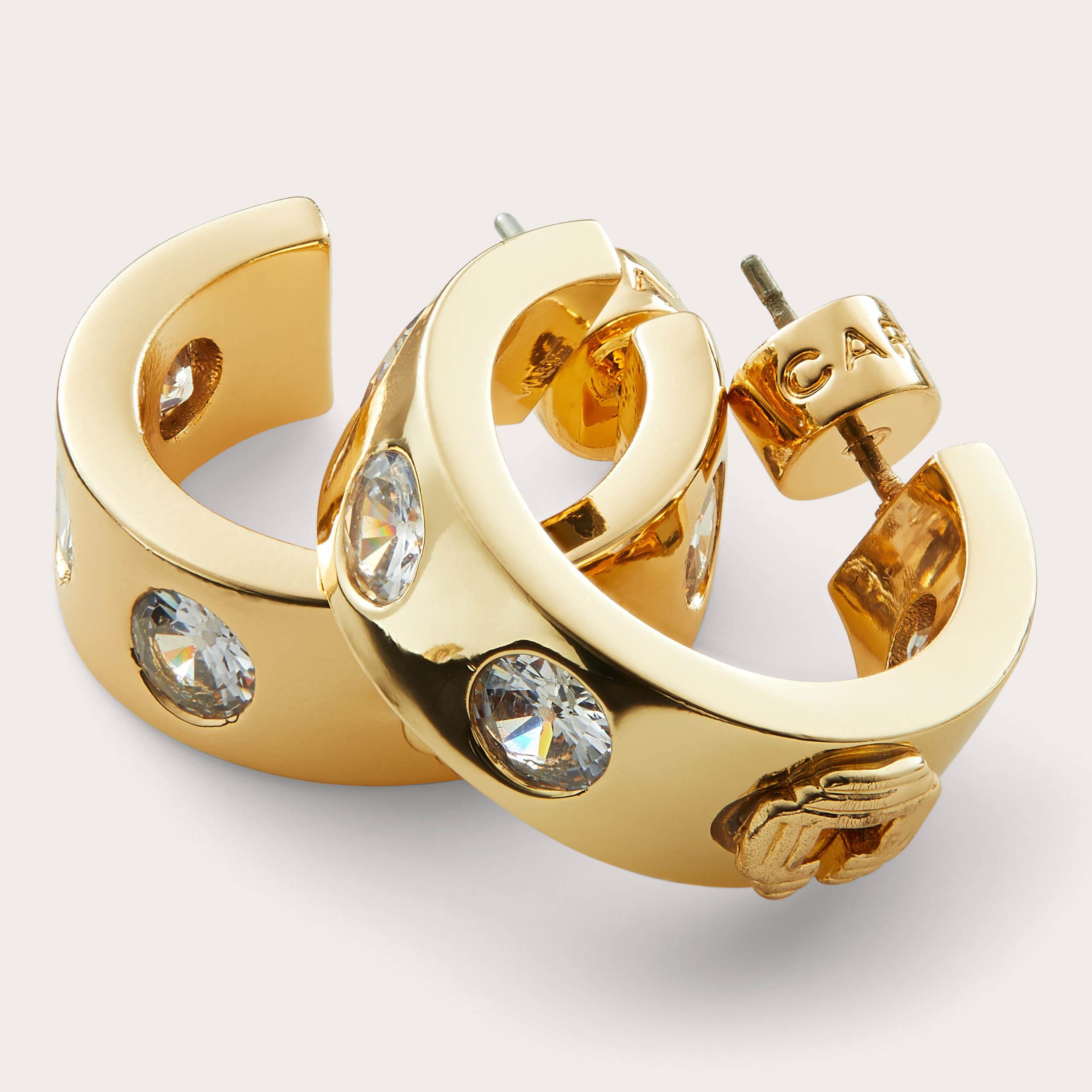 SIGNATURE HOOP Gold Tone Hoop Earrings by CARVELA